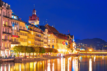 Fototapeta na wymiar Colorful Luzern Reuss river waterfront evening view