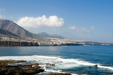 General view of the North coast of Tenerife island. Small towns of Bajamar and Tejina. Mount Teide in the background. Canary Islands, Spain. 