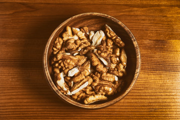 Crushed Walnuts Inside The Wooden Bowl