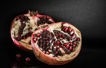 Red juicy ripe pomegranate. Winter fruits