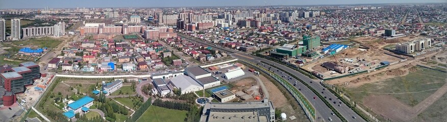 Fototapeta na wymiar Астана улица Кошкарбаева и проспект Таусыздык 