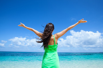 Woman in dress on beach