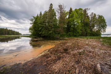 Mysterious island with a gate on the shore