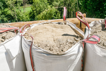 Bag with sand on construction site