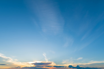 Fototapeta na wymiar Sunset dramatic blue sky orange clouds background