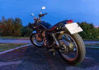 Fototapeta na wymiar classic road moto, night view