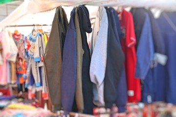 Fototapeta na wymiar shop clothes for sales at market