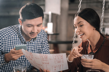 Close up of couple thinking about buying new apartment