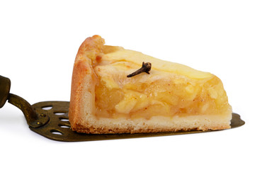 Traditional holiday apple pie. Baked dessert with anise, cloves and apples isolaed on white...
