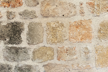 Texture of vintage old weathered wall of house outside. Abstract background. Horizontal color photography.
