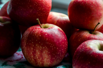 Fototapeta na wymiar red apples on black background