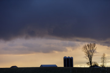Angry sky over farm, Mohawk Valley, New York State, USA.