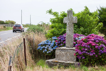 Old stone cross located near the road