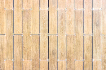 Walls and construction tiles. The texture of the tiles. The colors of ceramic tiles with a touch of wood.