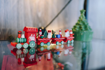 Vintage wooden Christmas toy train as a holiday decoration
