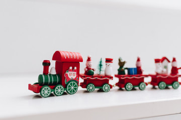 Vintage wooden Christmas toy train as a holiday decoration