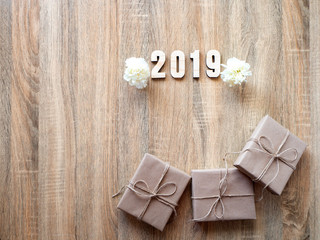 Happy new year 2019 decorative with gift box on wooden
