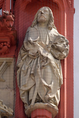 Fototapeta na wymiar Saint Thomas the Apostle statue on the portal of the Marienkapelle in Wurzburg, Bavaria, Germany