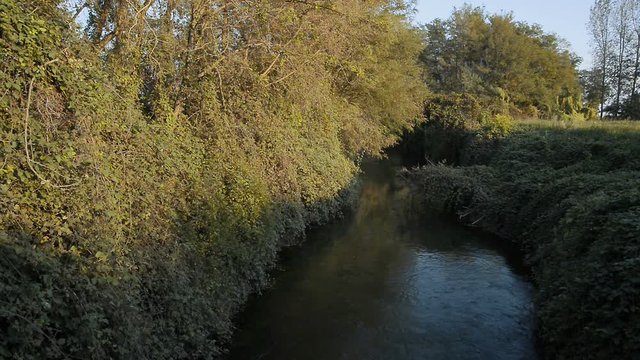 Bridge over an irrigation channel of the Lomellina at sunset