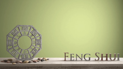 Wooden vintage table shelf with ba gua and 3d letters making the word feng shui with yellow green...