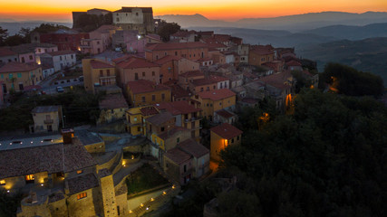 Aerial view at sunset of the small town of Montecalvo Irpino, in the province of Avellino, in...