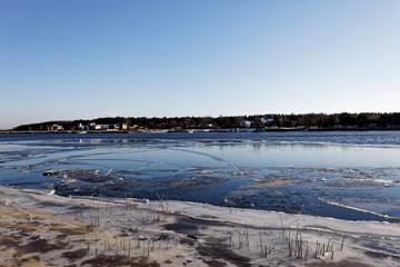 First frost on the river...