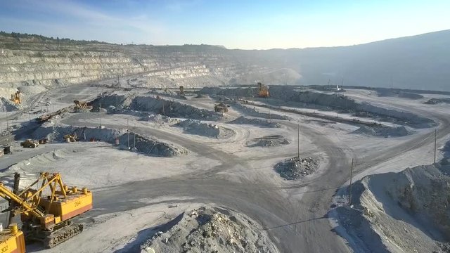 panorama excavators and machines on asbestos mining site