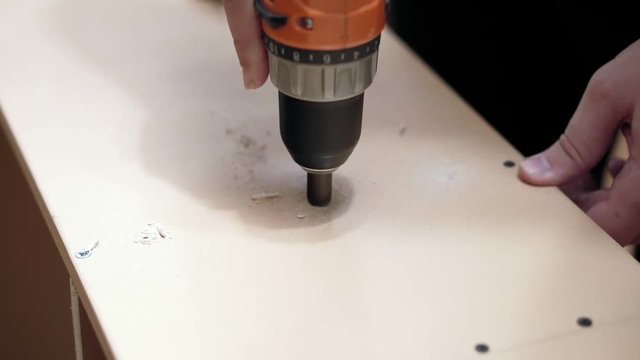 Work with a hand drill. Making tapered holes countersink.
