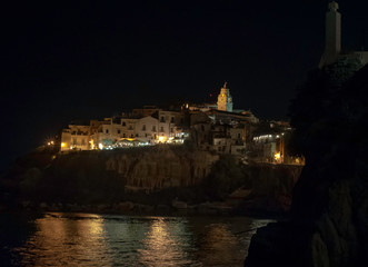 Night view of Vieste - main city of Capo Gargano, Apulia, Italy