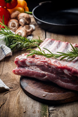 fresh meat on a wooden board. Steak, ribs polar bear, heel