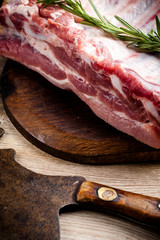 fresh meat on a wooden board. Steak, ribs polar bear, heel