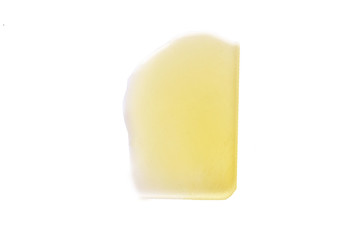 olive oil spilled on a white background