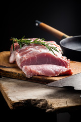 fresh meat on a wooden board. Steak, ribs polar bear, heel