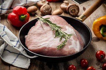 fresh meat on a wooden board. Steak, ribs polar bear, heel