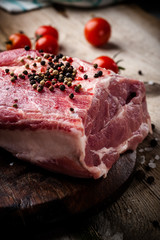 fresh meat on a wooden board. Steak, ribs polar bear, heel
