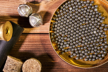 Hunting equipment for making cartridges on a wooden table