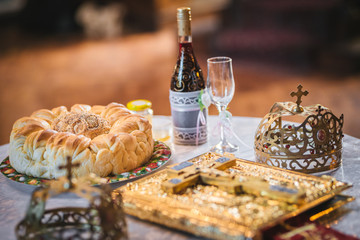 Crowns for a orthodox wedding ceremony and a religious book