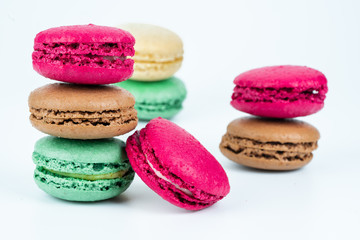 colorful macaroons on white background