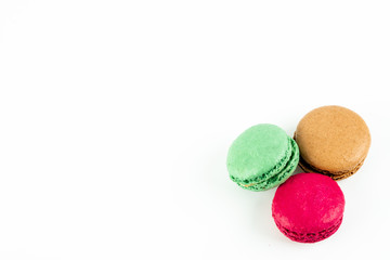 colorful macaroons on white background