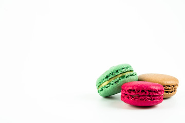 colorful macaroons on white background