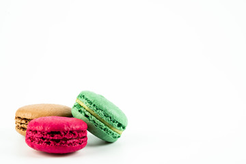 colorful macaroons on white background