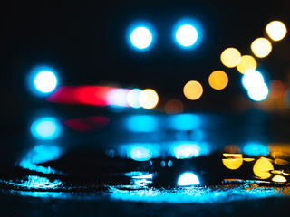Wet city streets at night with bokeh in background - 236488922