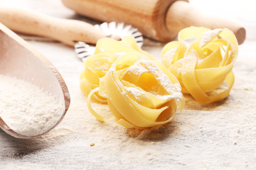 pasta. Fresh homemade pasta with pasta ingredients on the rustic table.