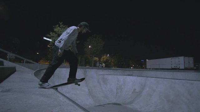 GENEVA, NOVEMBER 2018&nbsp;: Skate rider in skatepark in night slowmotion
