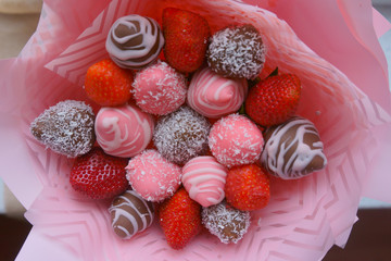 bouquet of strawberries, candy, chocolate