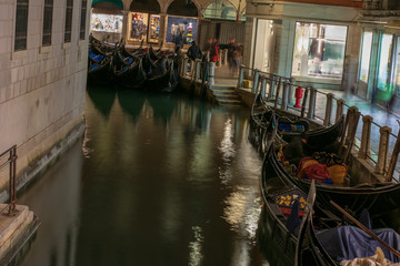 Fototapeta na wymiar Docked gondolas in Venice Italy 