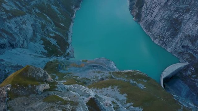 Aerial, Linth Limmern power station and water reservoir, The Alps, Switzerland 4k.