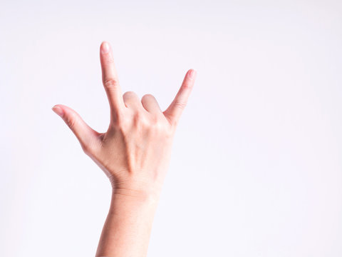 Hand sign meaning I love you; shoot at the back of the hand.