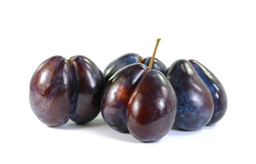 plums isolated on the white background