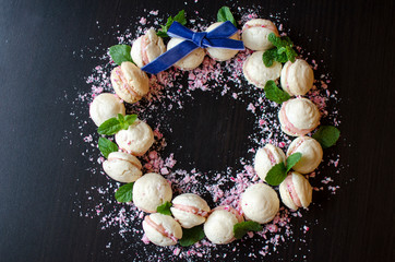 Wreath of French Macarons with Mint and a Blue Ribbon